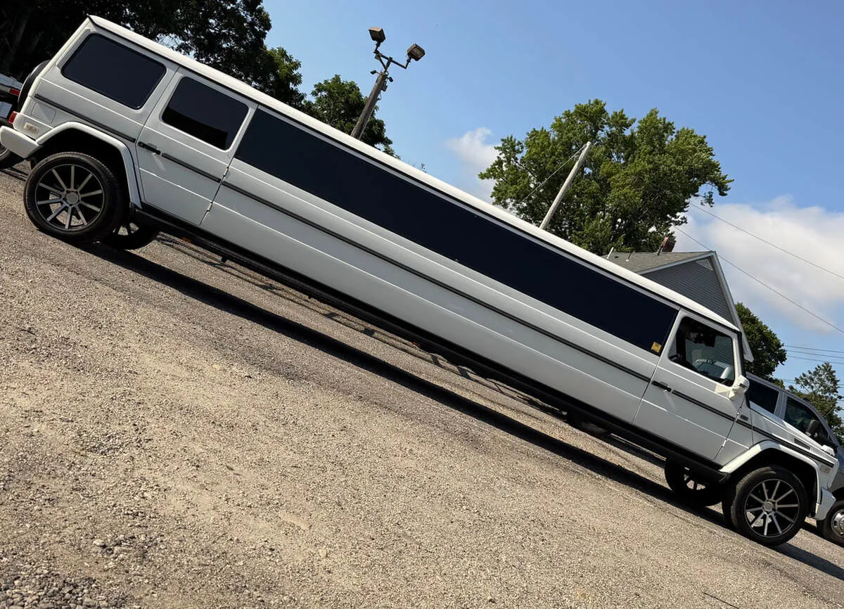 White Mercedes-Benz G Wagon exterior with tinted windows, photo 5 for limo rental White Mercedes-Benz G Wagon exterior with tinted windows, photo 5 for limo rental