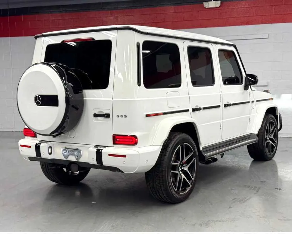 White Mercedes-Benz G Wagon exterior with running boards, photo 3 for wedding car rental in Southfield, MI
