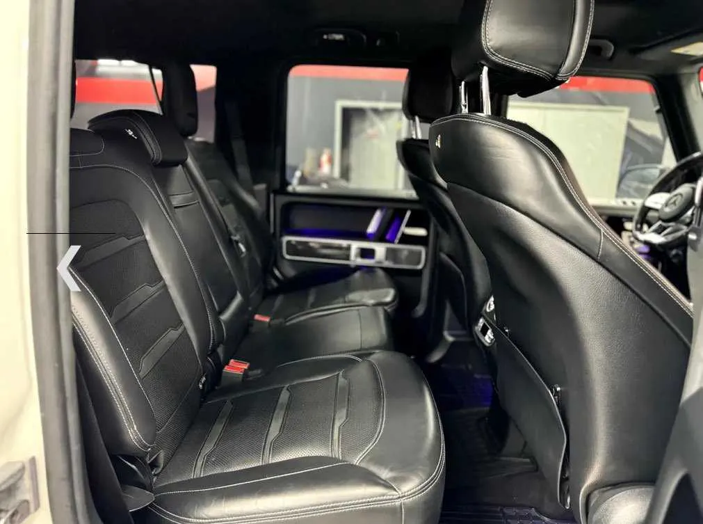 Mercedes-Benz G Wagon interior with LED accent lighting for wedding car rental in Southfield, MI