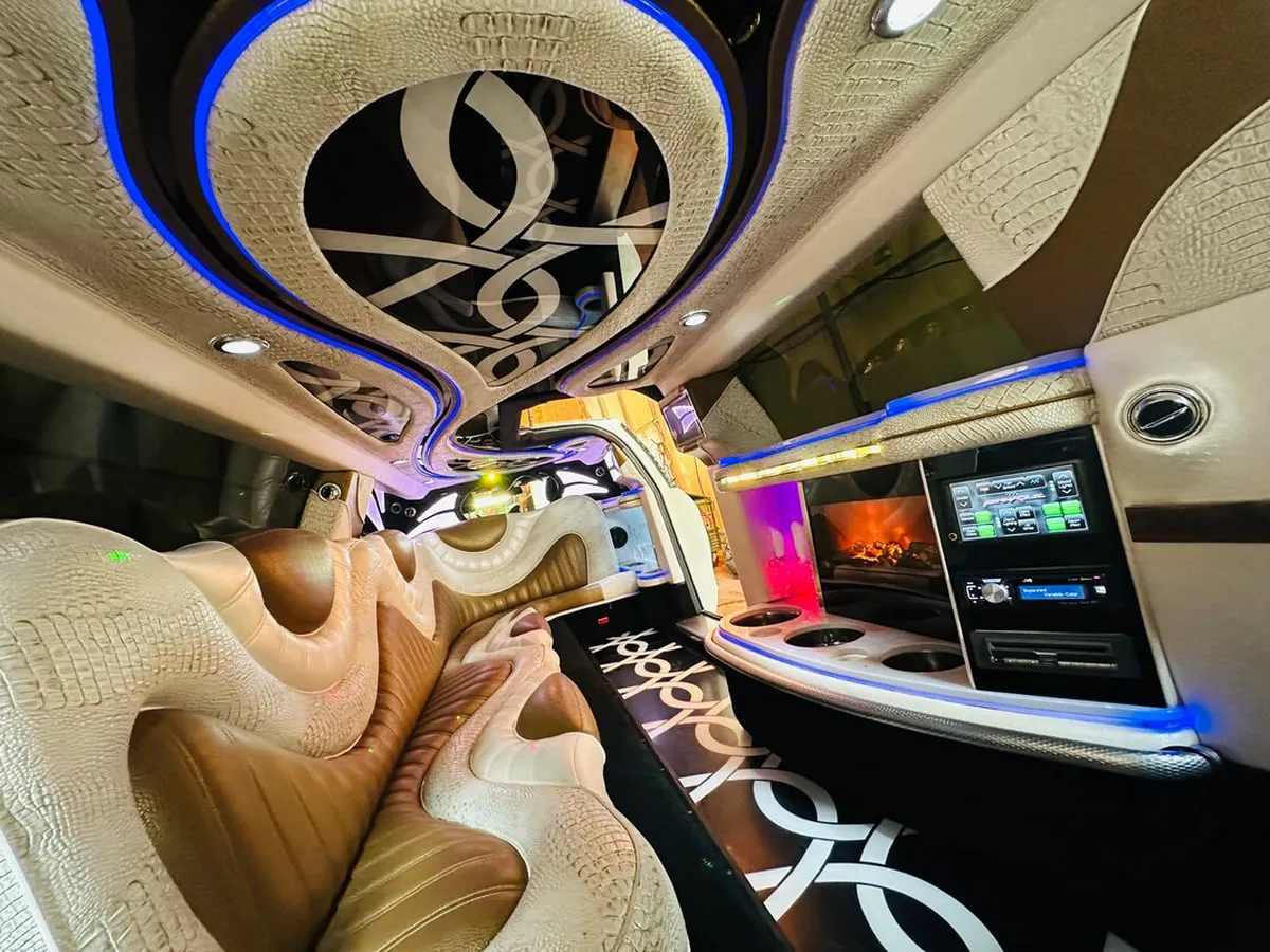Mercedes-Benz Jet Doors Limousine interior with perimeter lounge seating and LED accent lighting, photo 11 for wedding car rental in North Attleboro, MA