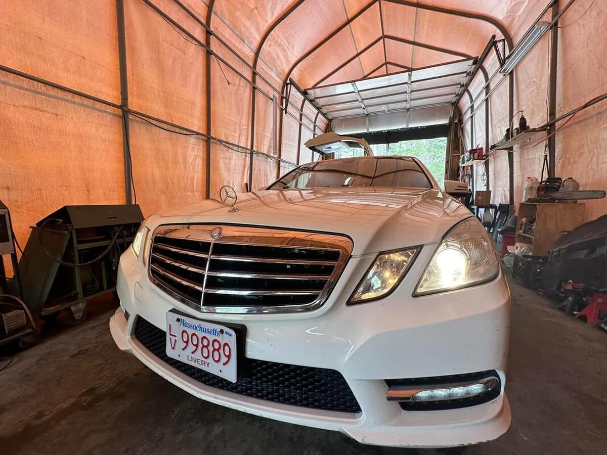 White Mercedes JET Doors Limousine exterior for limo rental in Oklahoma