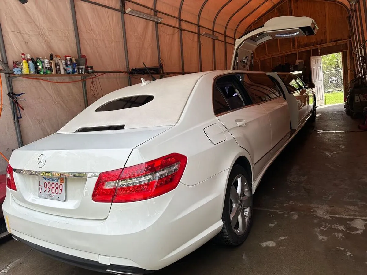 White Mercedes-Benz Jet Doors Limousine exterior with bridal (jet) door for wedding car rental in North Attleboro, MA
