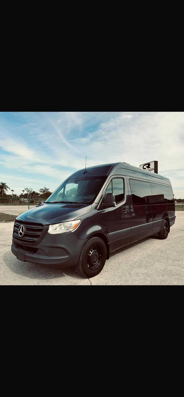 Black Mercedes Limo Coach exterior for party bus rental in Brownsville, MN