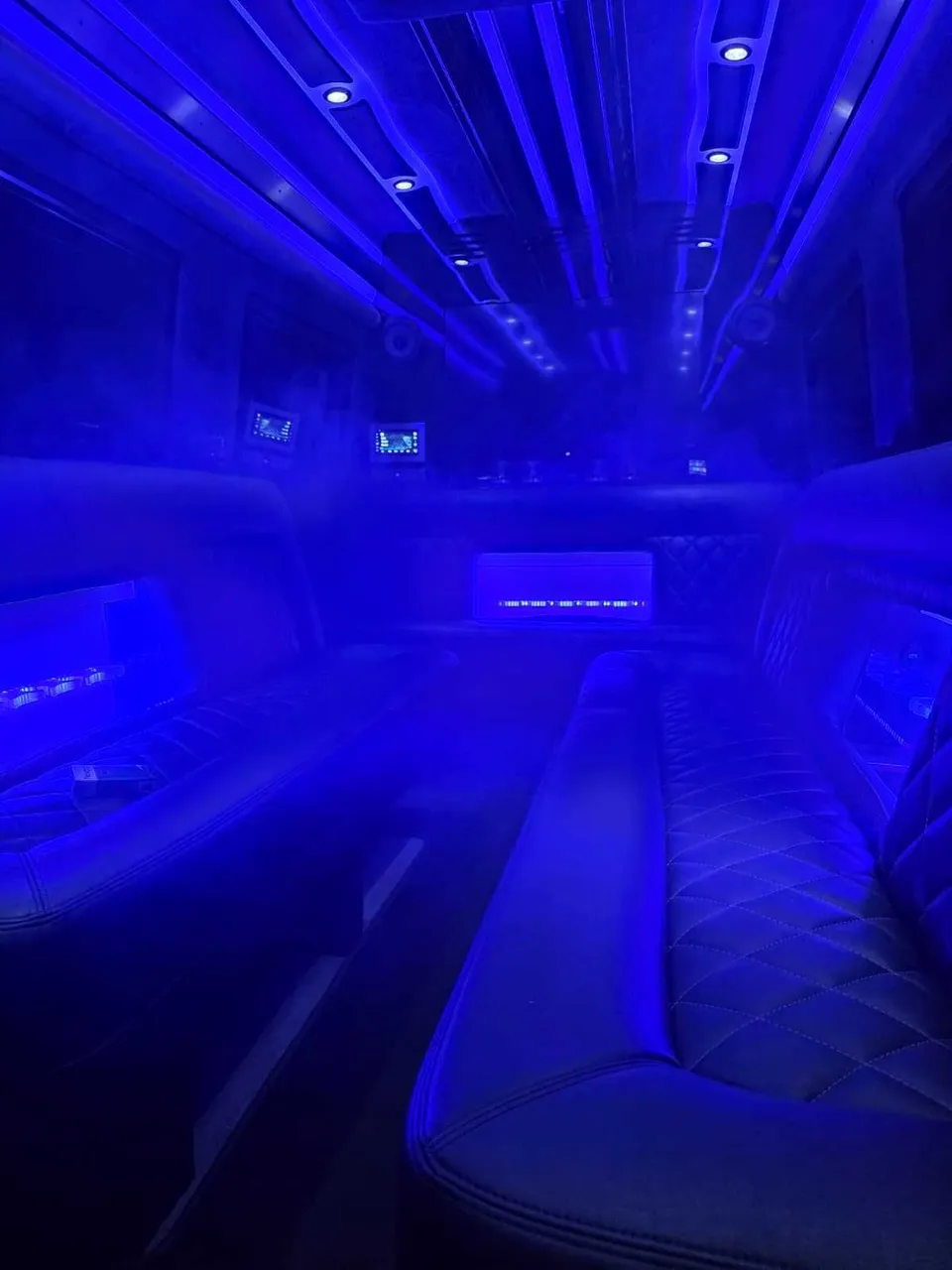Mercedes Limo Sprinter interior for party bus rental in Howard City, MI