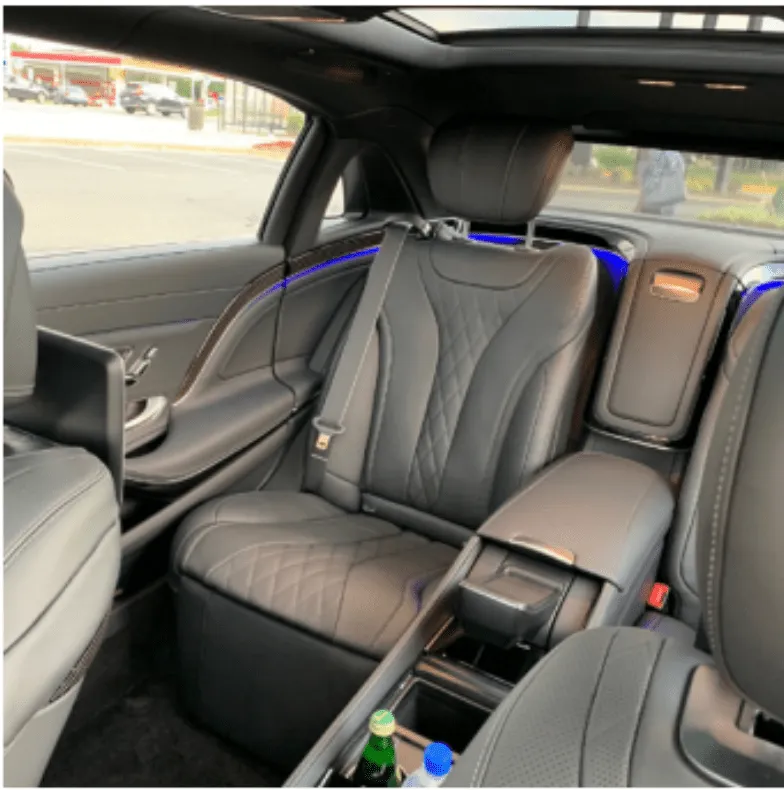 Mercedes-Maybach interior with cup holders and LED accent lighting for wedding car rental Mercedes-Maybach interior with cup holders and LED accent lighting for wedding car rental