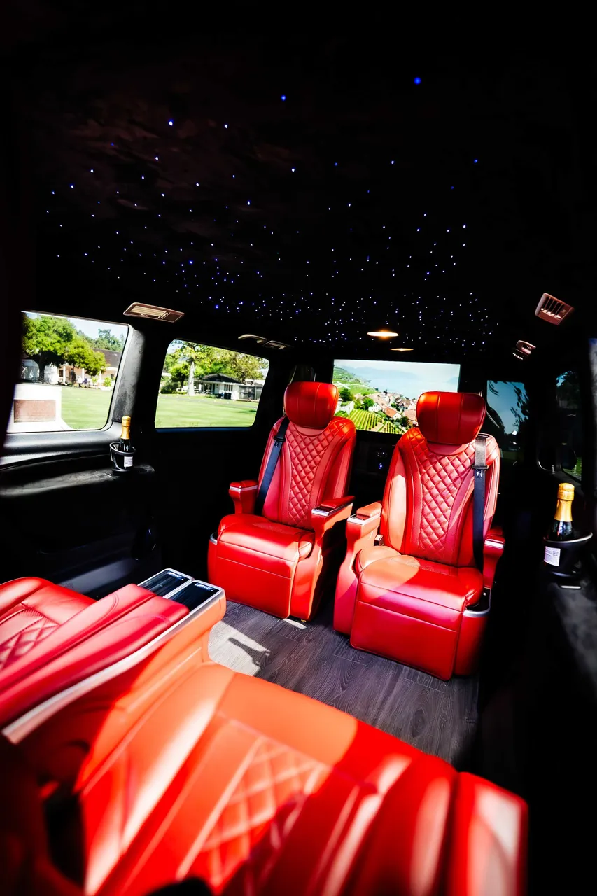 Mercedes-Benz Metris interior with captain's chairs, starlight or fiber-optic ceiling and wood-look flooring for minibus rental