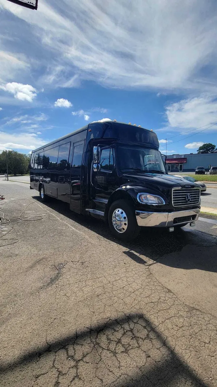 Black Mercedes Party Buses exterior for party bus rental in Hamburg, IA