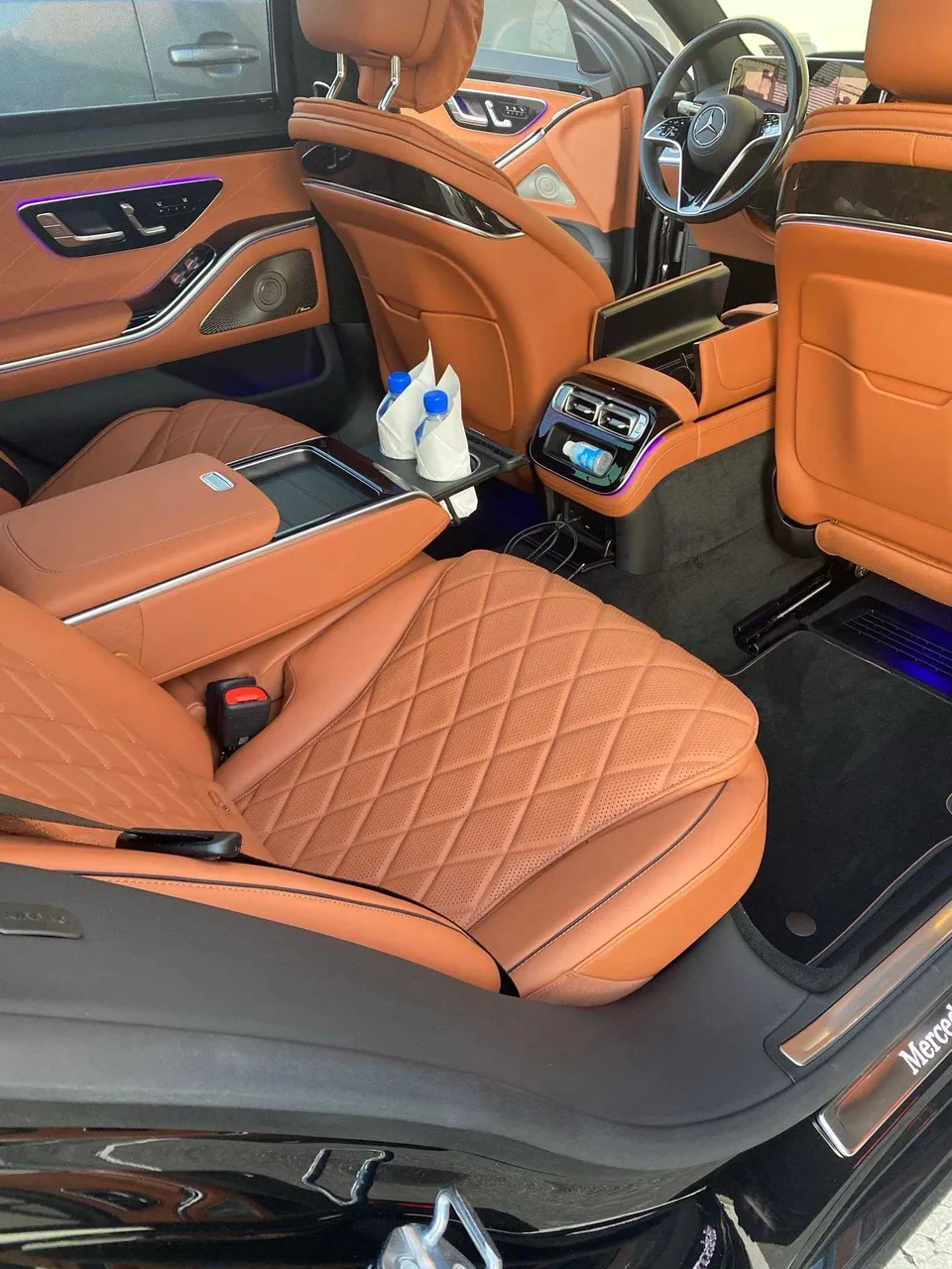 Mercedes-Benz S-Class interior with rear passenger controls and LED accent lighting for wedding car rental Mercedes-Benz S-Class interior with rear passenger controls and LED accent lighting for wedding car rental