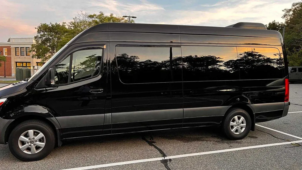 Black Mercedes Sprinter for mini coach rental in Sagamore Beach, MA