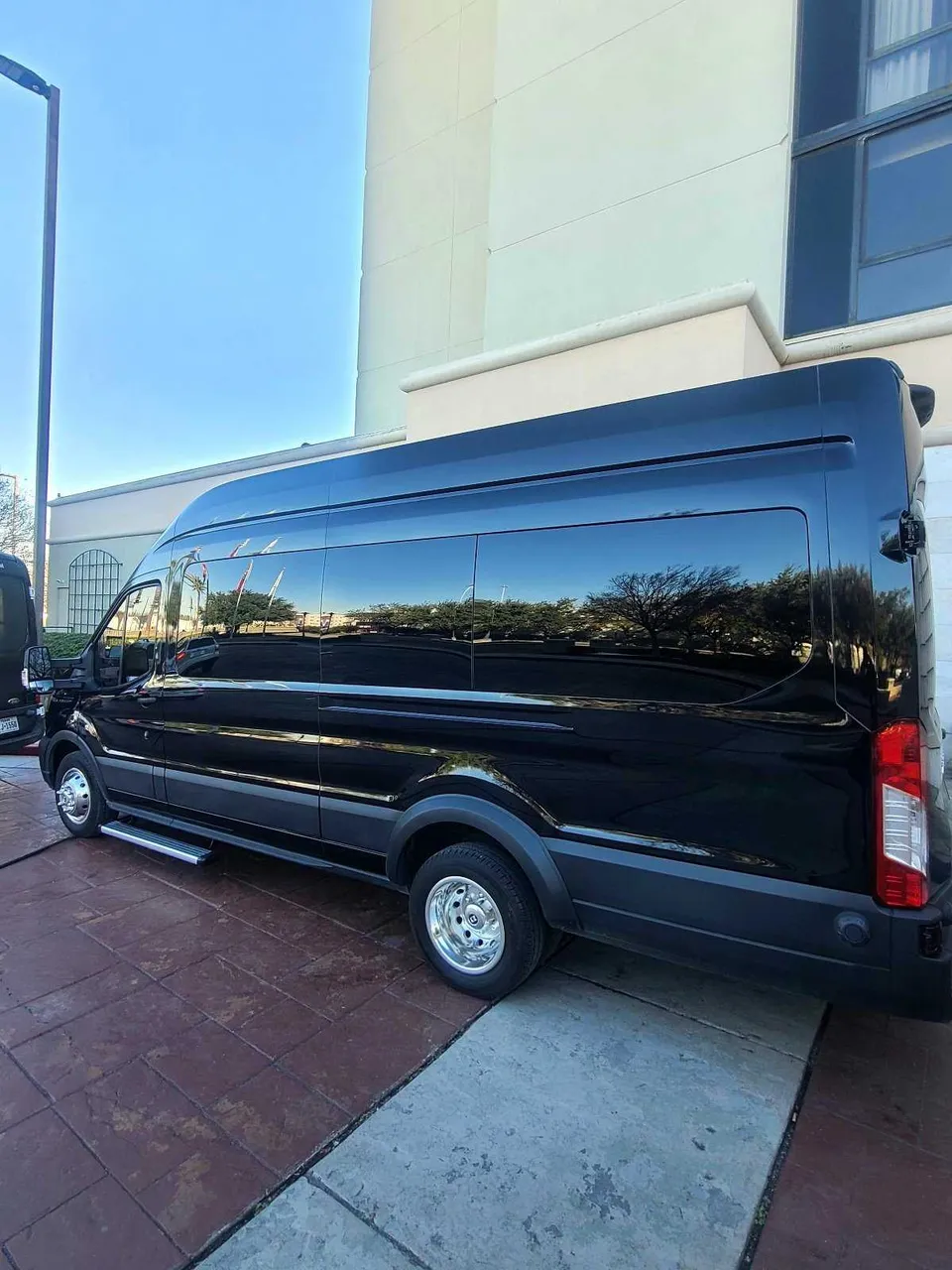 Black Mercedes Sprinter Van for minibus rental in Greensburg, LA
