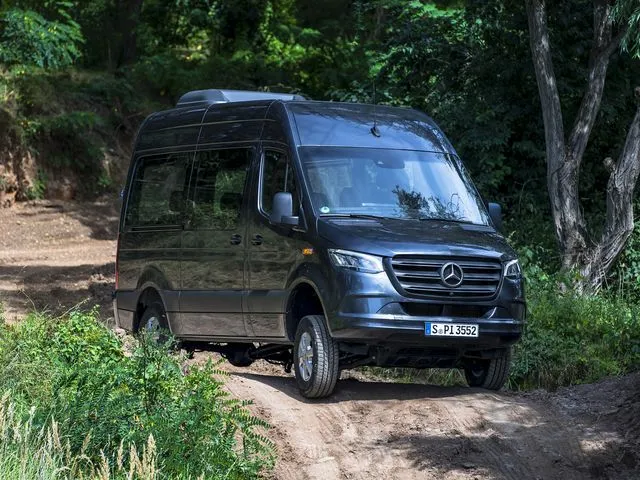 Black Mercedes Sprinter Van for mini coach rental in Syracuse, MO