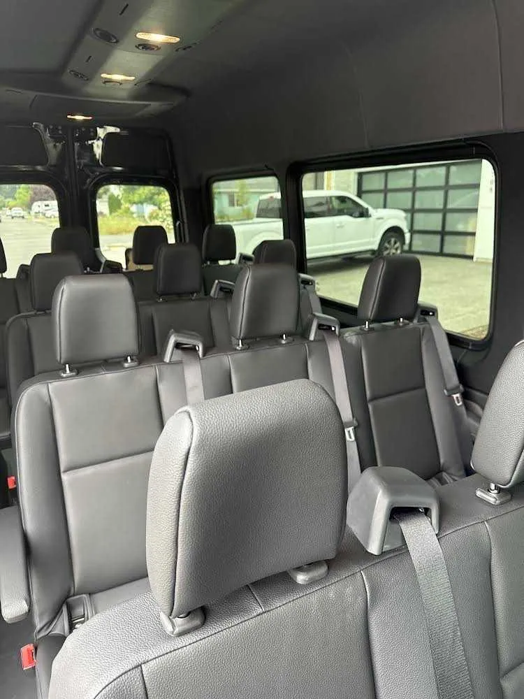 Black Mercedes Sprinter Van for mini coach rental in Idleyld Park, OR