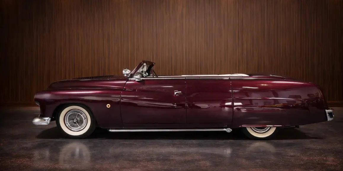 Red Mercury Lead Sled 1951 Vintage exterior with convertible roof for wedding car rental Red Mercury Lead Sled 1951 Vintage exterior with convertible roof for wedding car rental