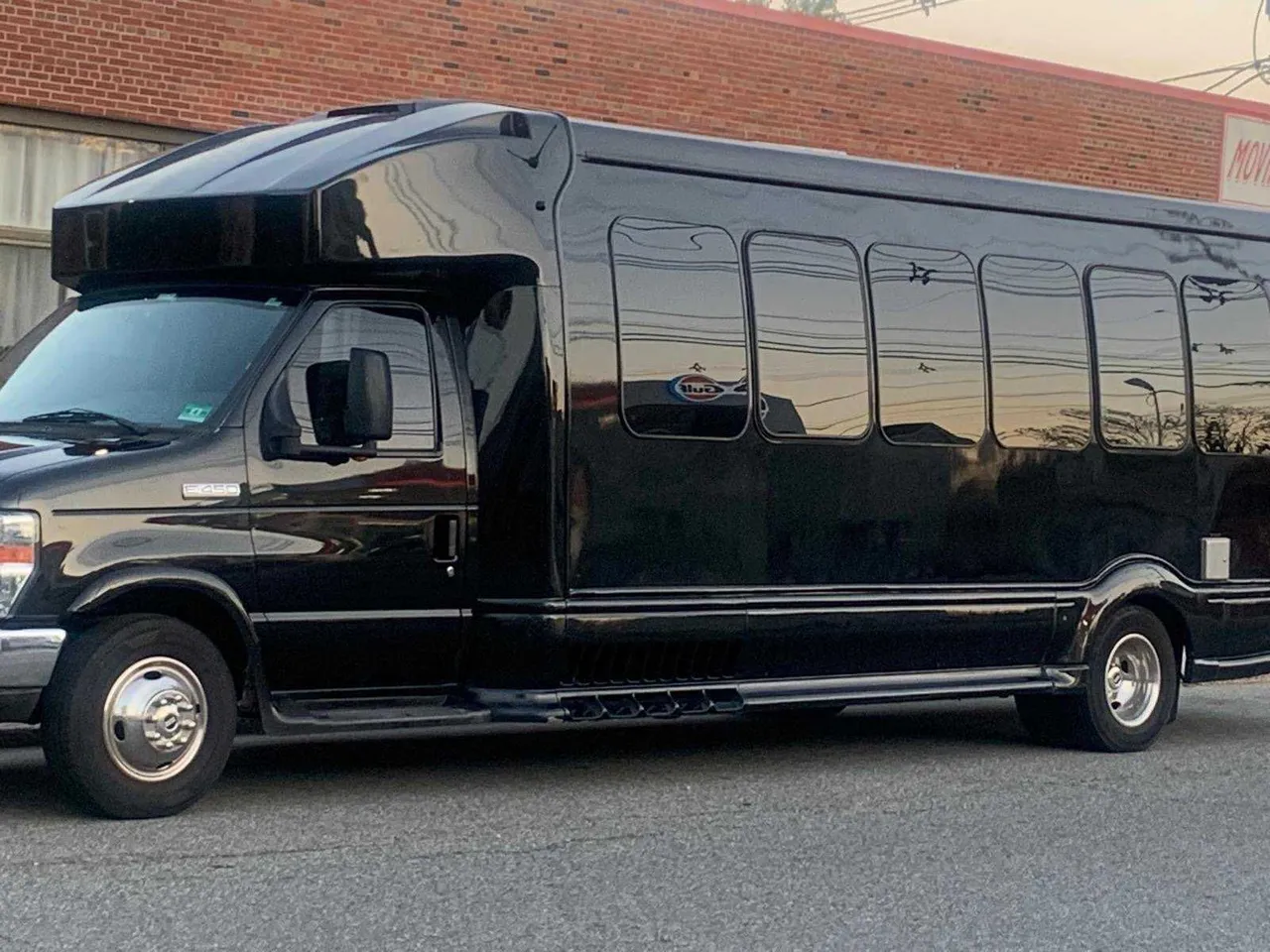 Black Mini Coach for mini coach rental in Roosevelt, NJ