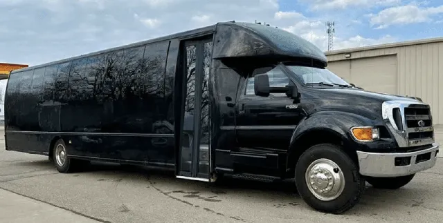 Black 30 Passenger Mini Coach with tinted windows for minibus rental in San Antonio, TX Black 30 Passenger Mini Coach with tinted windows for minibus rental in San Antonio, TX
