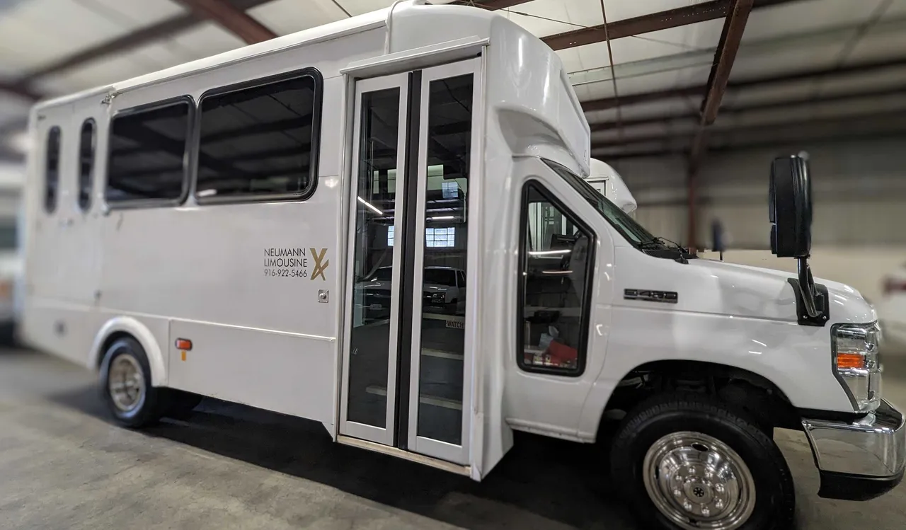White Mini Moto Coach for mini coach rental in Camino, CA