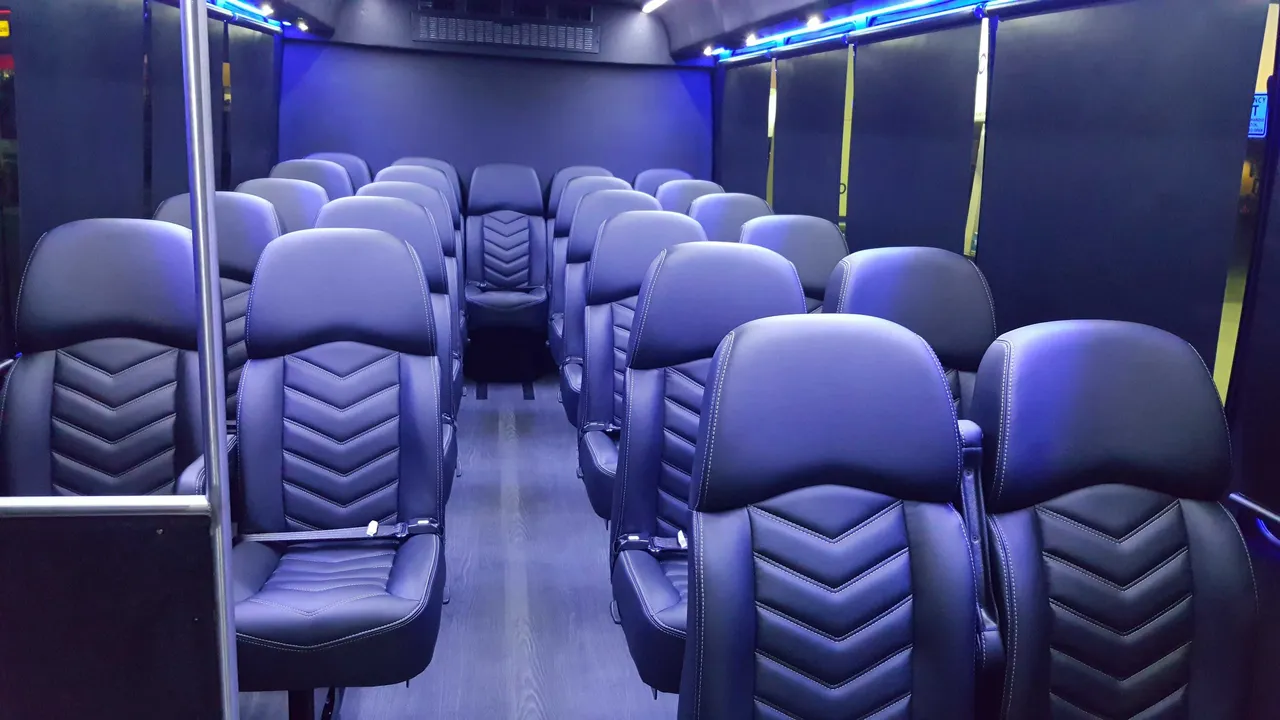 23 Passenger Mini Coach interior with window shades and LED accent lighting for minibus rental in San Joaquin County, CA 23 Passenger Mini Coach interior with window shades and LED accent lighting for minibus rental in San Joaquin County, CA