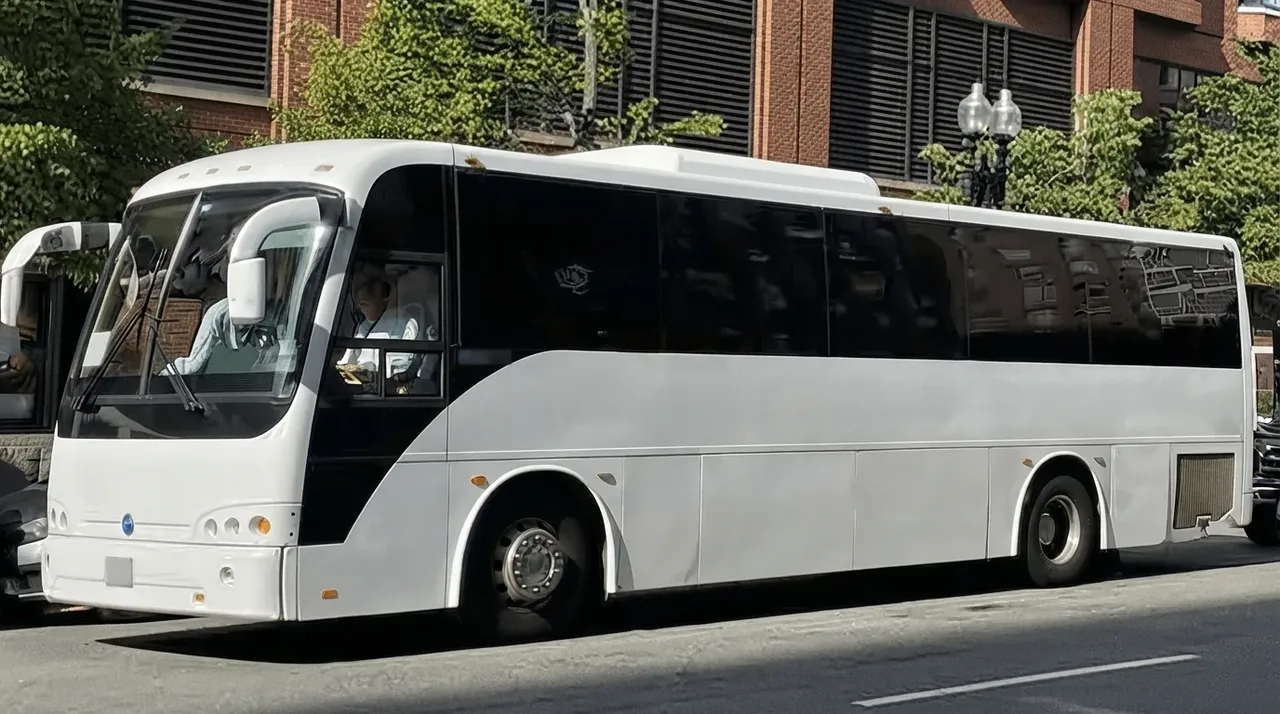 White 40 Passenger Motor Coach for charter bus rental