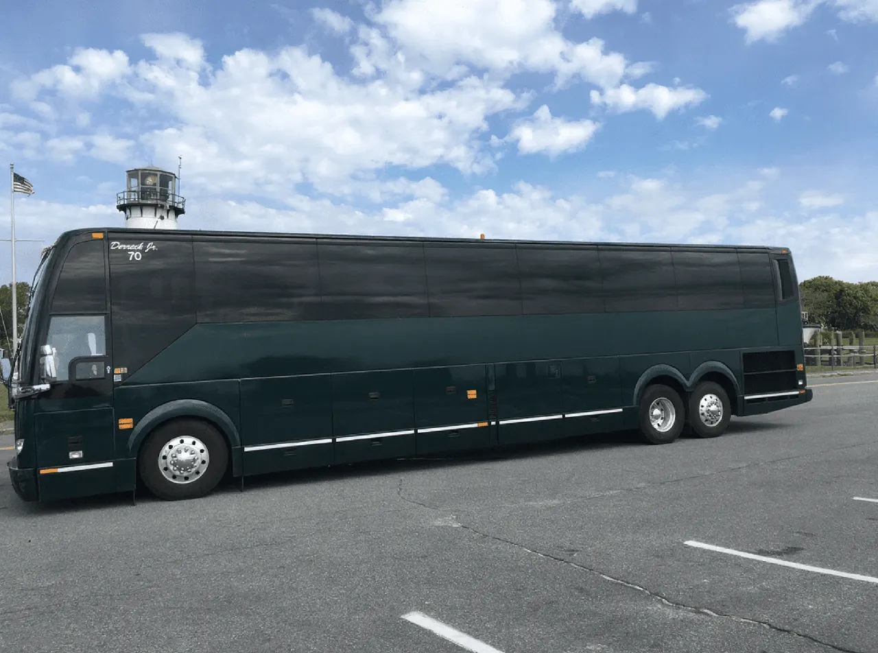 56 Passenger Motor Coach with tinted windows for charter bus rental in Curwensville, PA