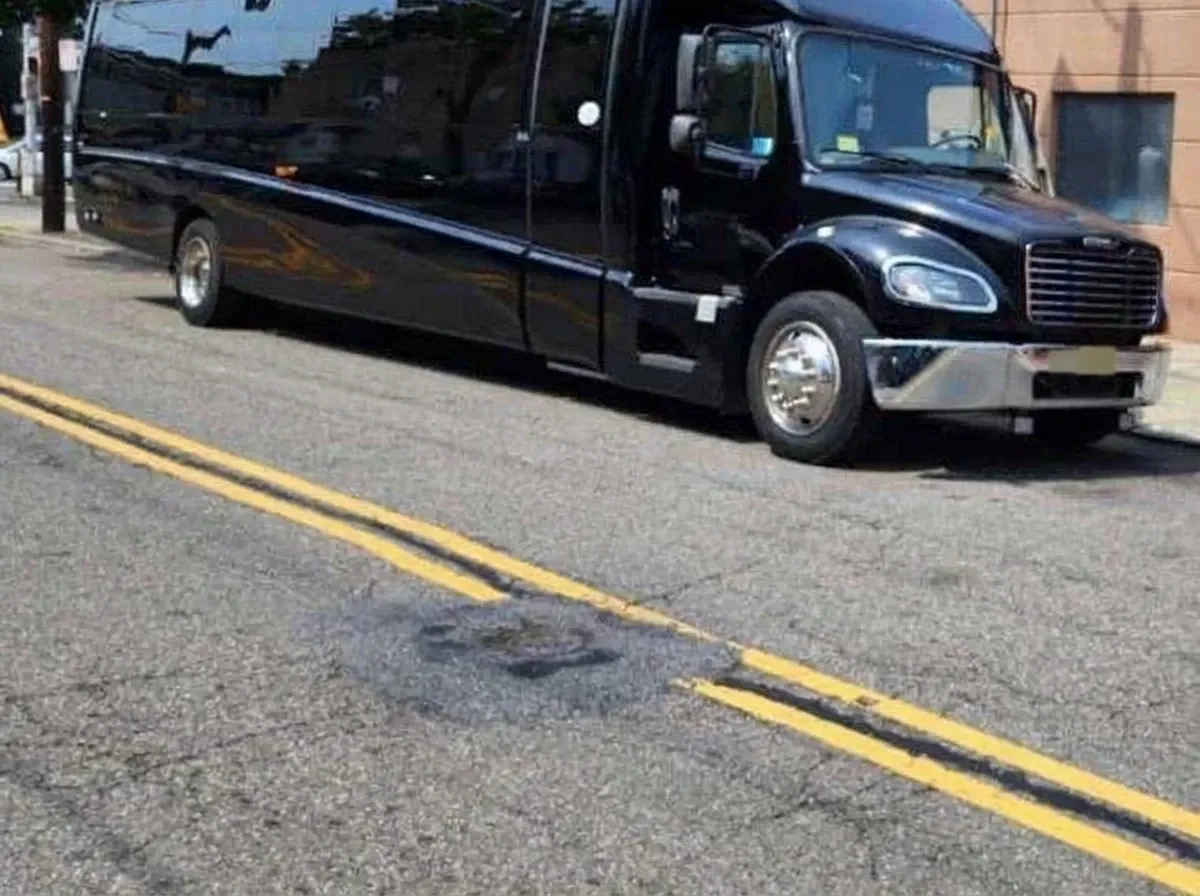 Black 40 Passenger Motorcoach for charter bus rental Black 40 Passenger Motorcoach for charter bus rental