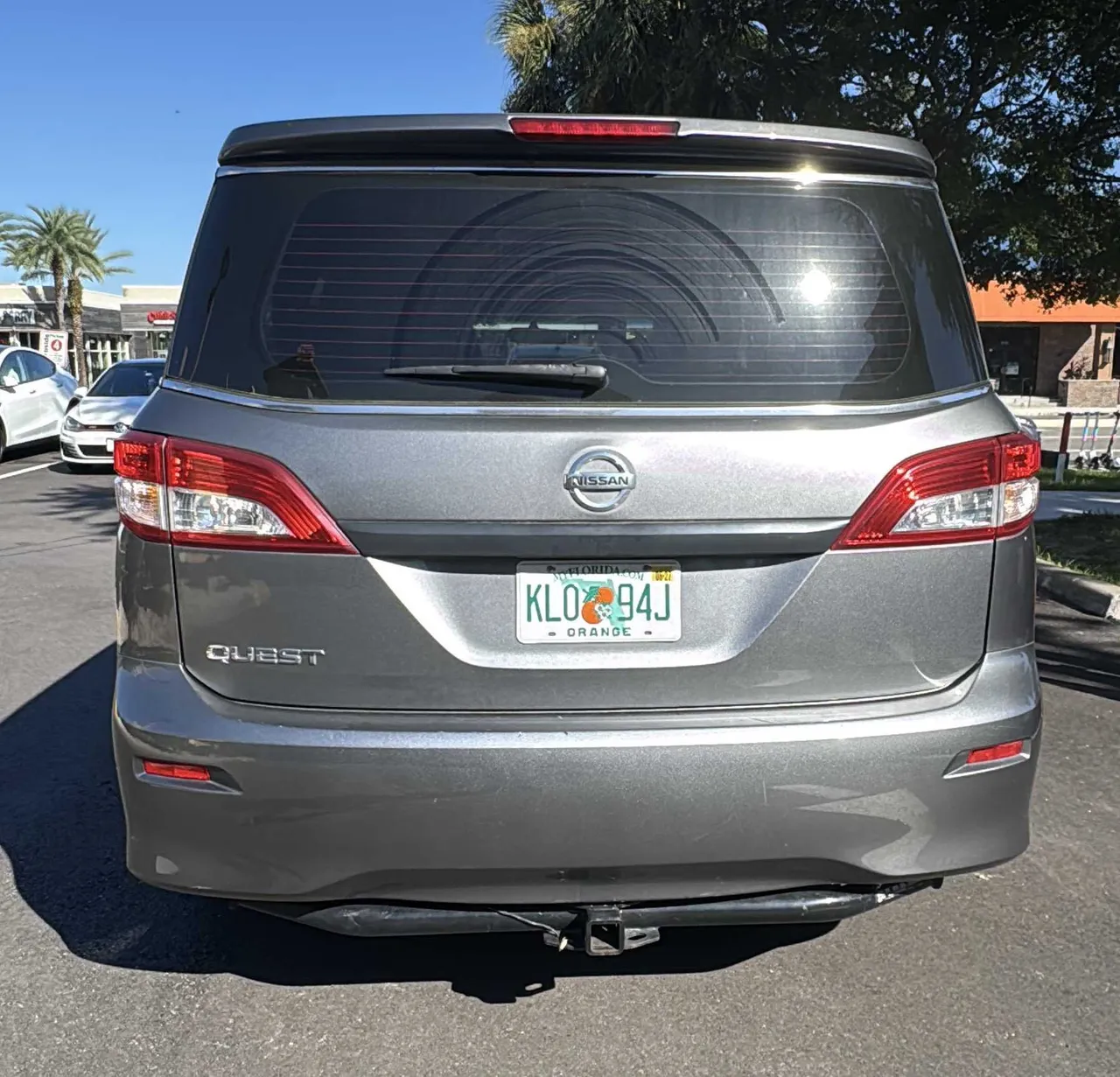 Gray Nissan Quest exterior for minibus rental Gray Nissan Quest exterior for minibus rental
