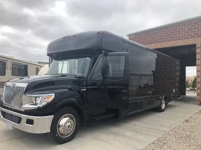 Black 28 Passenger Party Bus for party bus rental