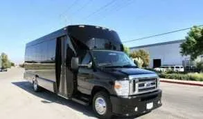 Black Party bus F550 exterior for party bus rental in Cedar Springs, MI