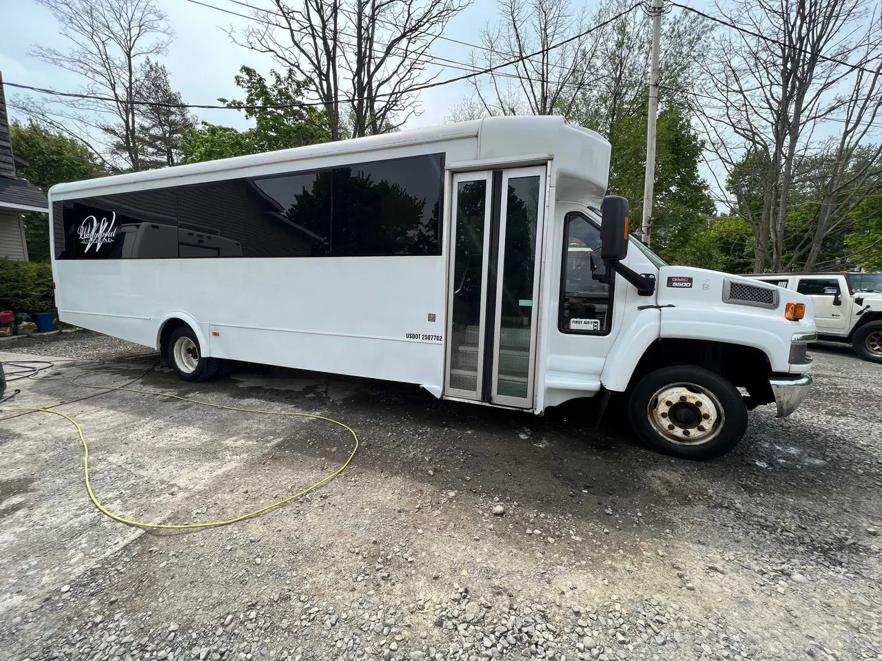 White Party Bus - Sophia Loren exterior for party bus rental in Cedar Springs, MI