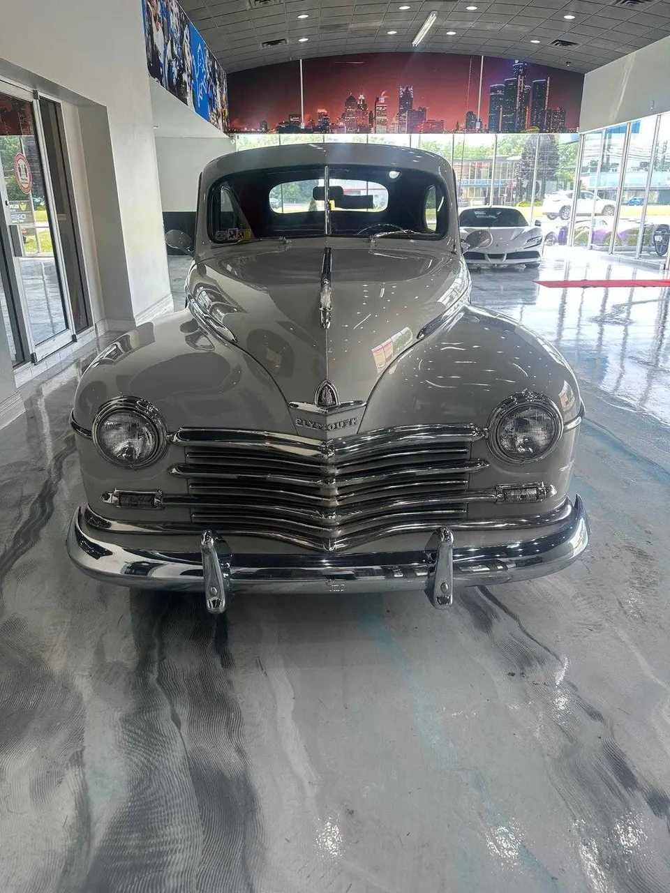 Gray Plymouth Classic for wedding car rental