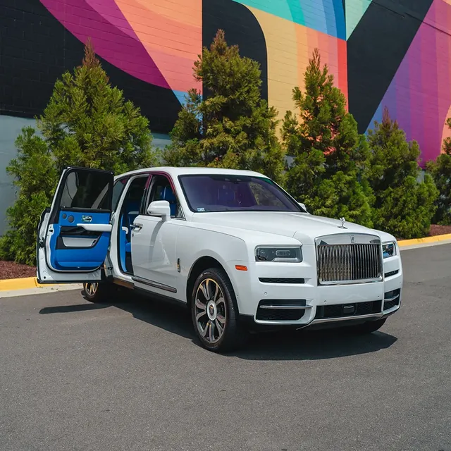White Rolls-Royce Cullinan with All Blue Interior for airport transfers