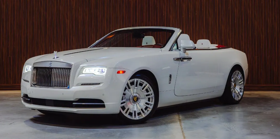 White Rolls Royce Dawn with convertible roof for Rolls-Royce car rental in Ansonville, NC