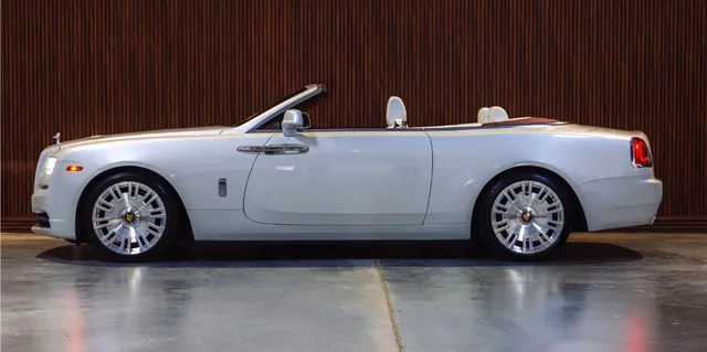 White Rolls Royce Dawn exterior with convertible roof for Rolls-Royce car rental in Ansonville, NC