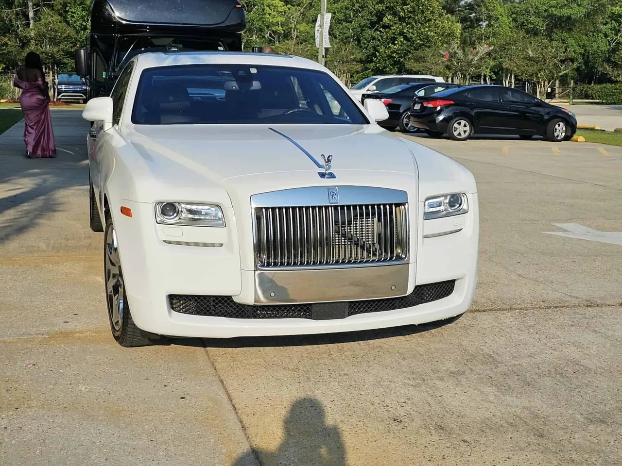 White Rolls Royce Ghost for wedding car rental in Fostoria, IA