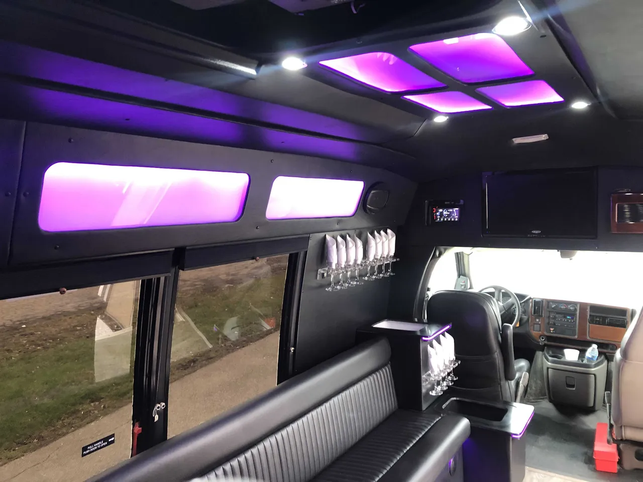 Small party bus interior, photo 2 for party bus rental in Cedar Springs, MI
