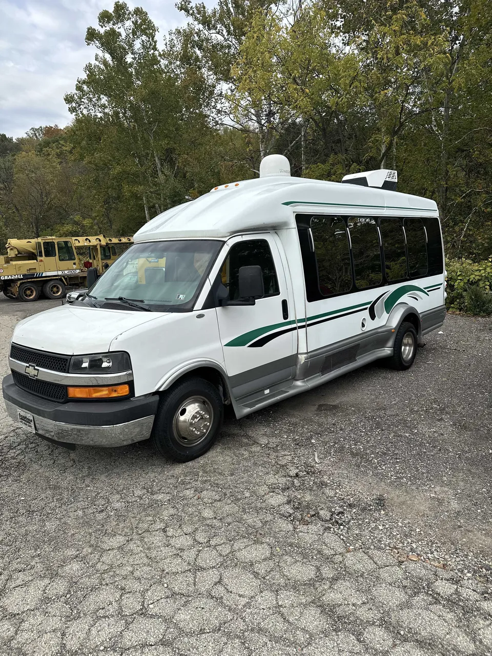 White Small party bus exterior for party bus rental in Cedar Springs, MI
