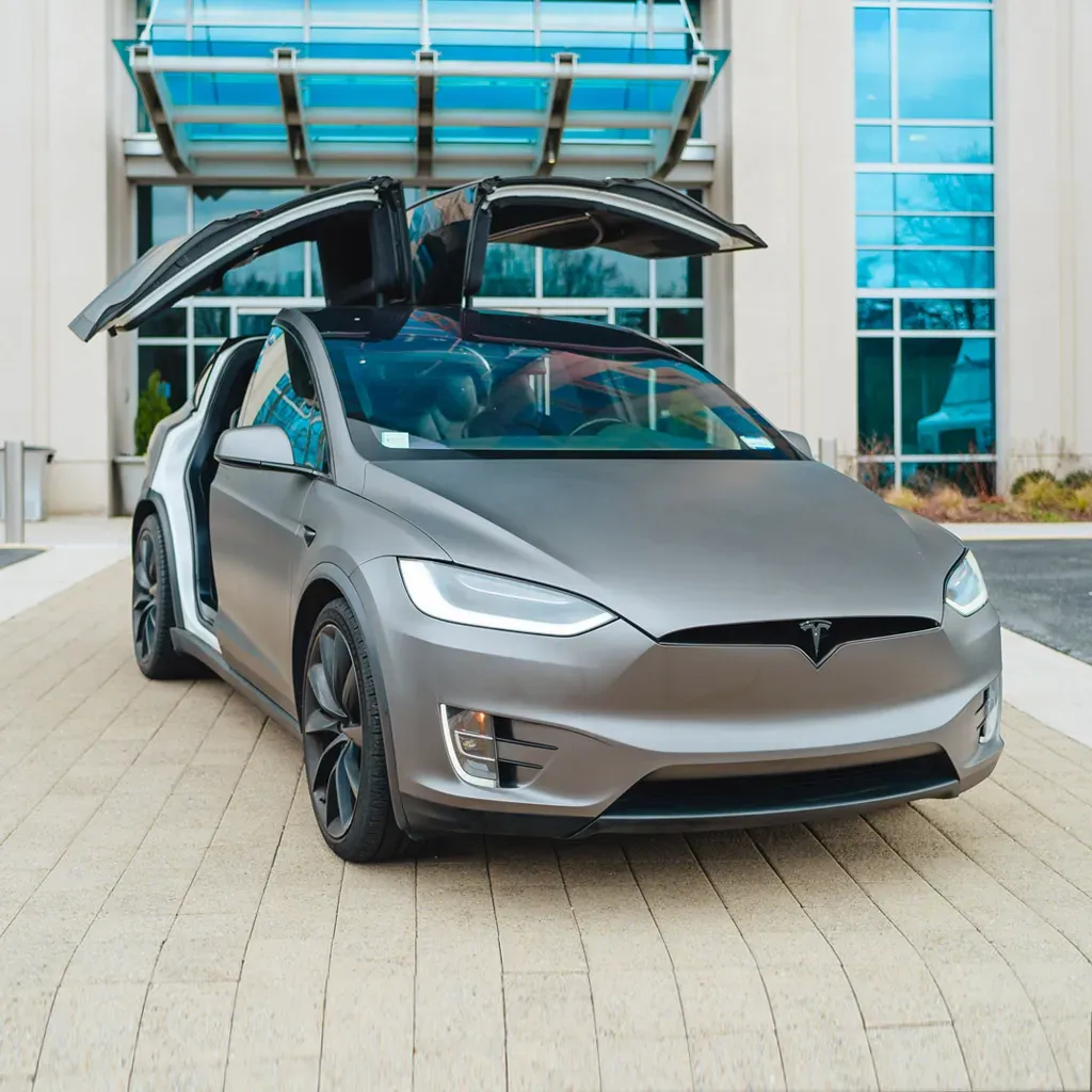 Silver Tesla Model X for airport transfers Silver Tesla Model X for airport transfers