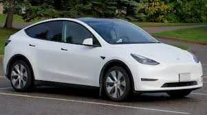 White Tesla for sedan rental in New London, NC