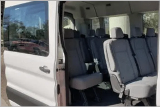 White Transit Mini Bus