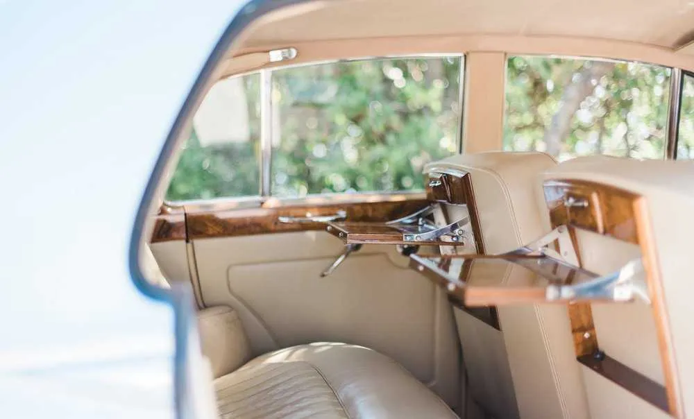 Bentley 1957 interior for wedding car rental in Bell City, LA