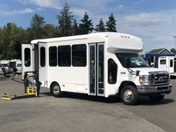 Black VIP Executive ADA Mini Coach 14 Passenger (ADA Wheelchair Lift) for charter bus rental in Kenmore, WA