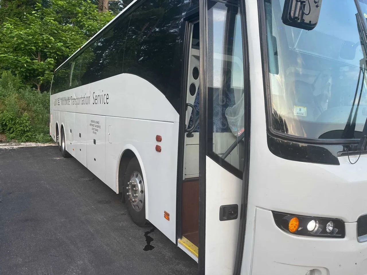 White Volvo Motor Coach for charter bus rental in Wentworth, NH