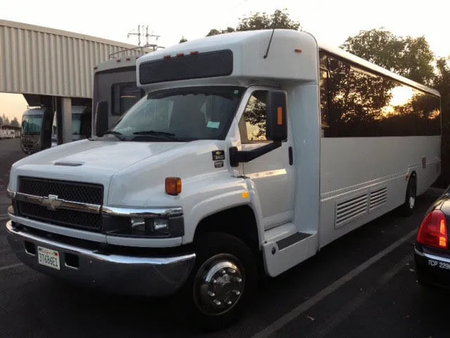 White Chevrolet Shuttle Bus for minibus rental