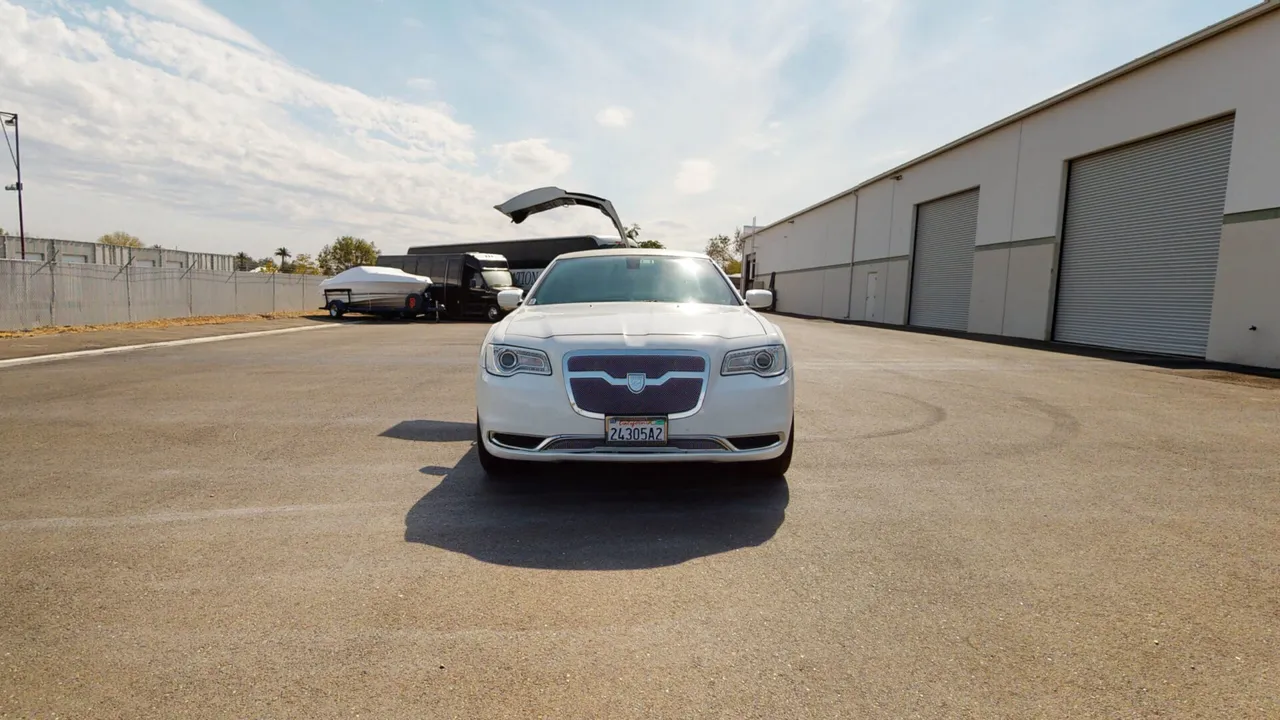 White Chrysler 300 Stretch Limousine for wedding car rental in Sacramento, CA