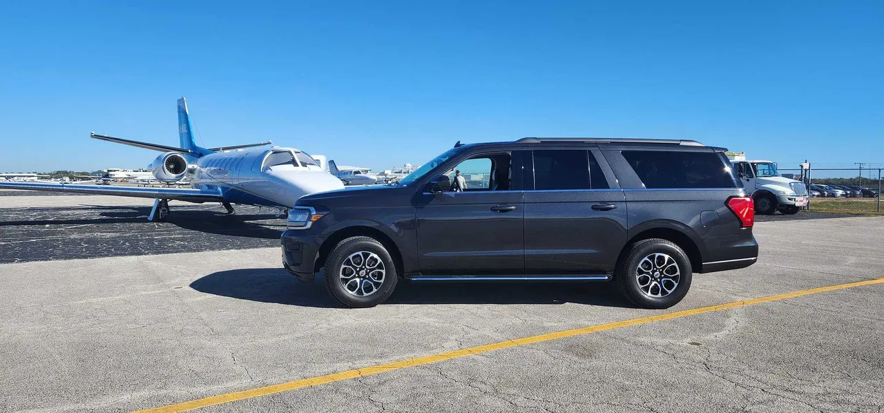 Gray 7 Passenger Expedition Max SUV for airport transfers in Putnam County, FL