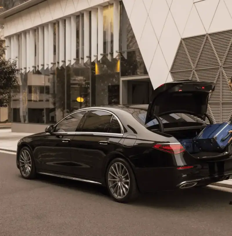 Executive sedan loaded for the airport